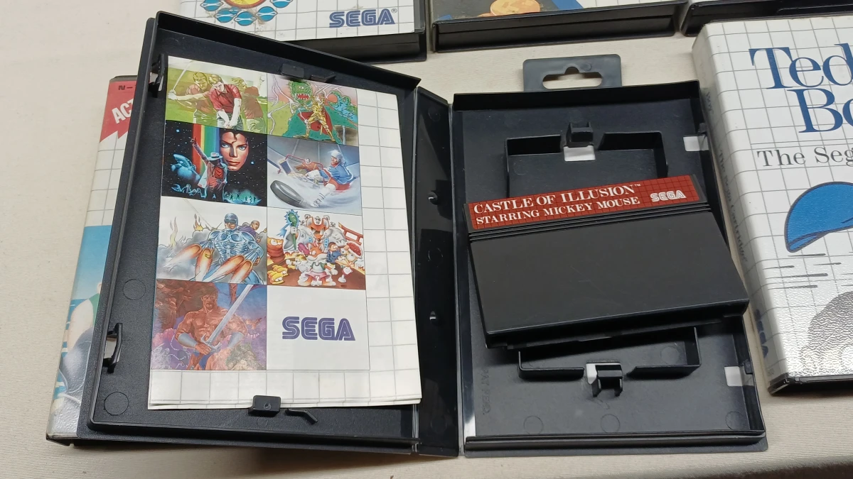 Set van 12 Sega Master System spellen met handleidingen - foto 3