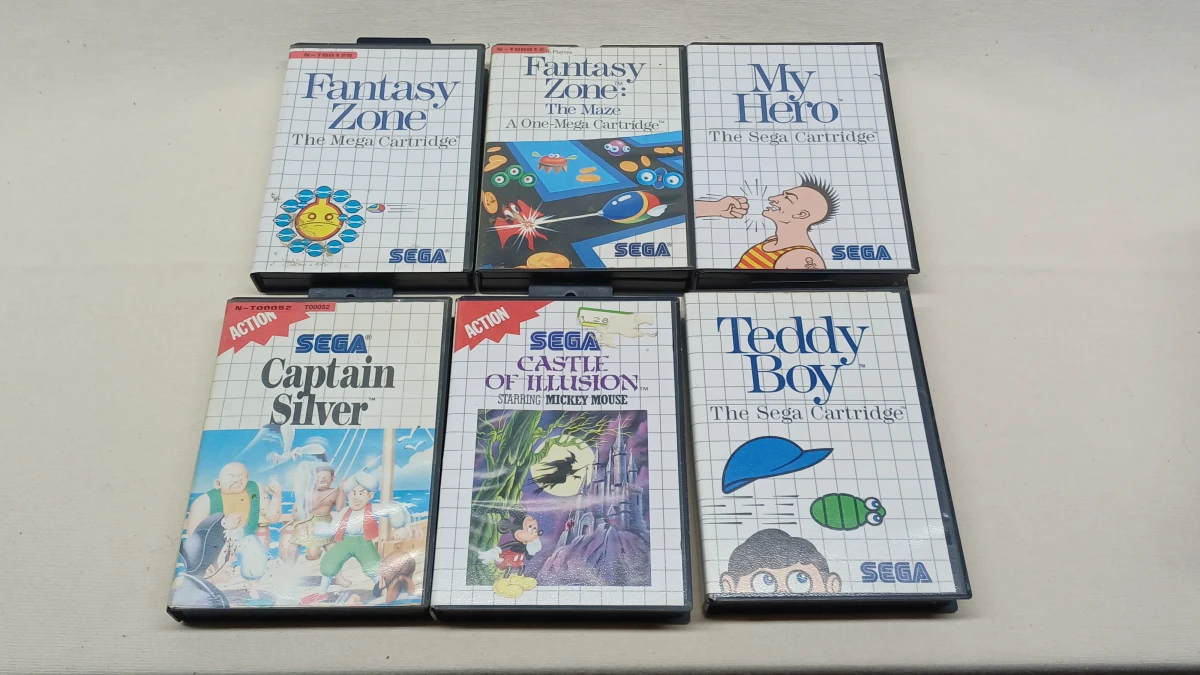 Set van 12 Sega Master System spellen met handleidingen - foto 2