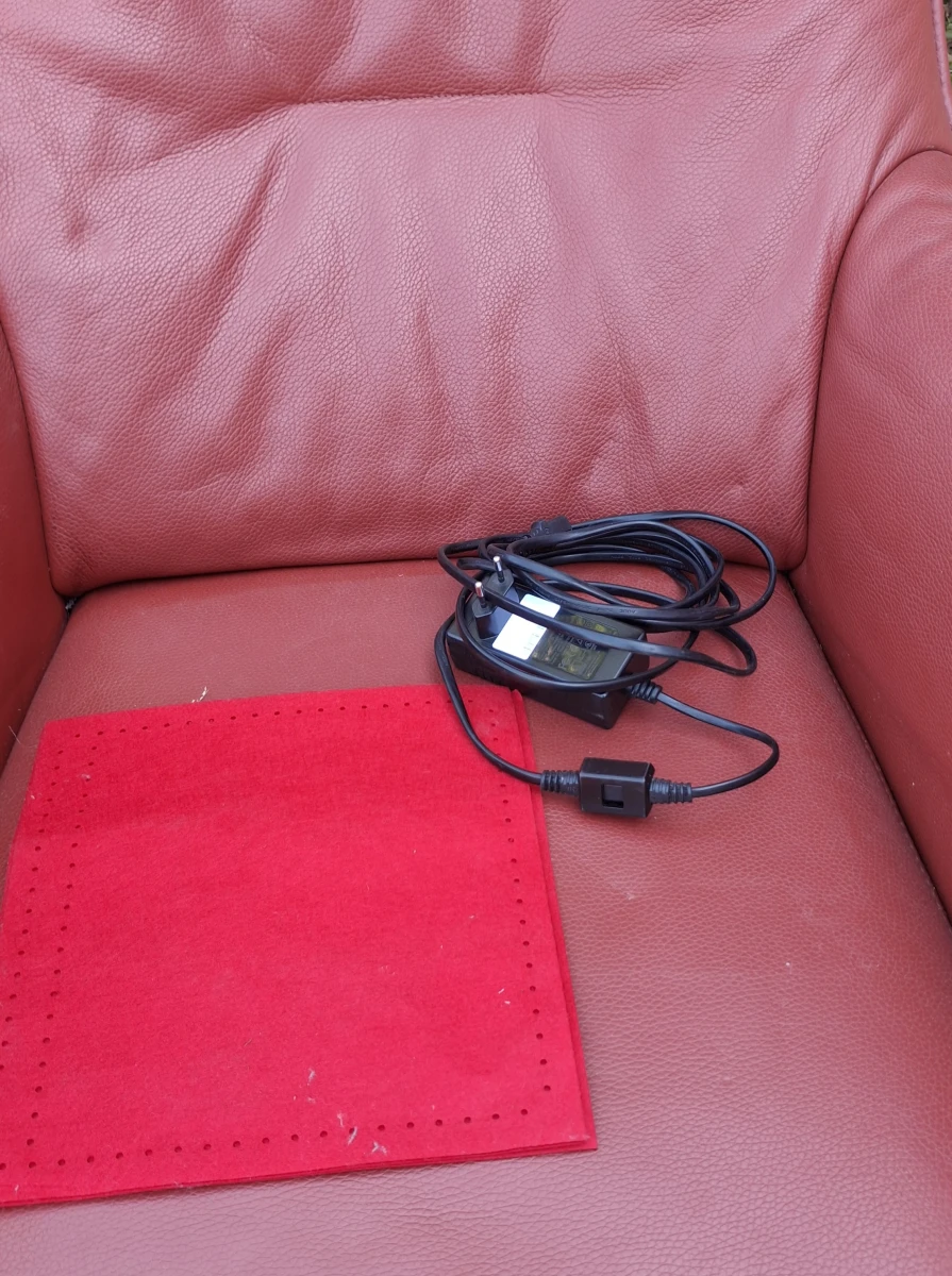 Rode leren relaxzetel met elektrische bediening