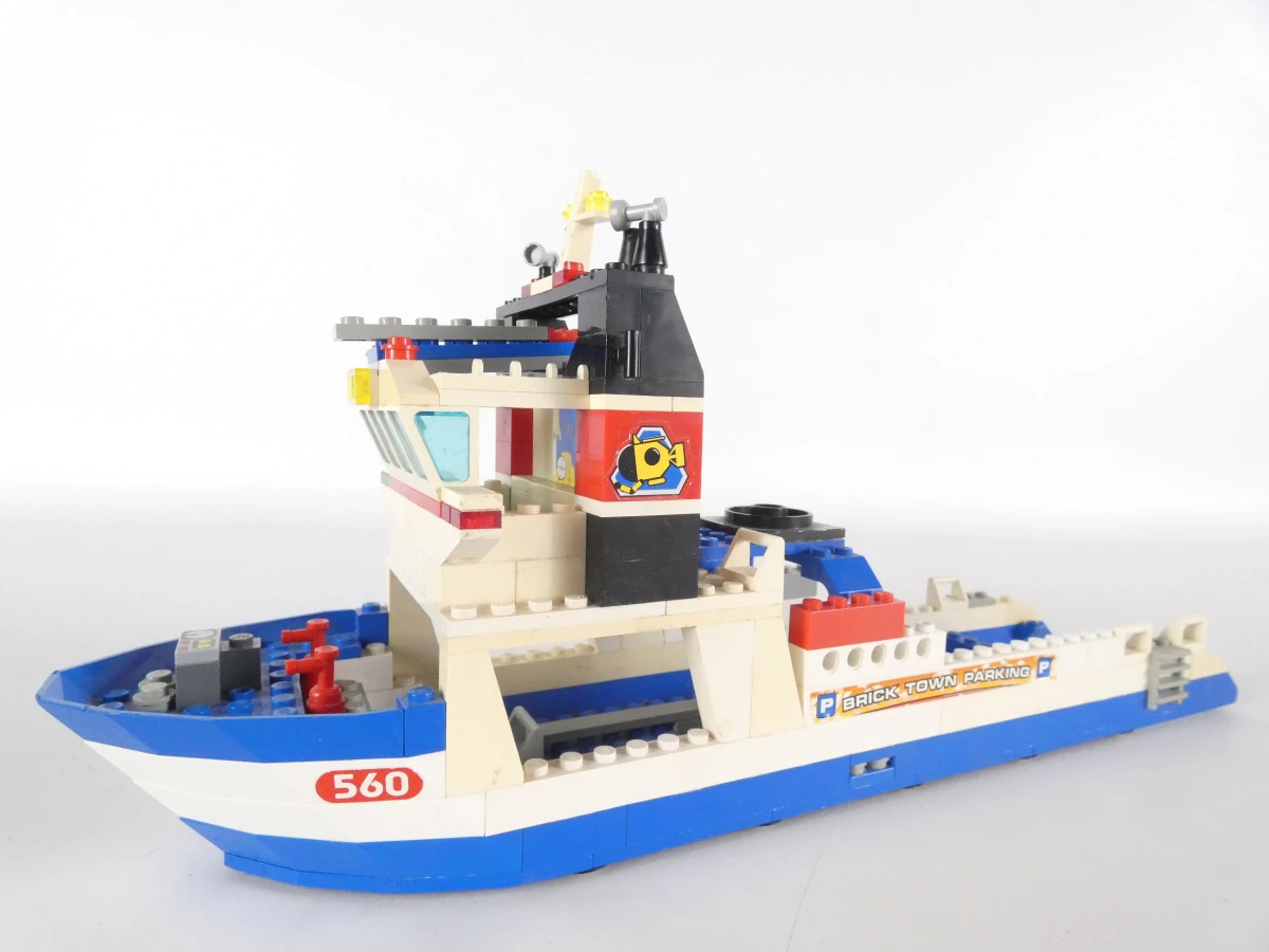 Diverse LEGO bouwsets met voertuigen en handleidingen