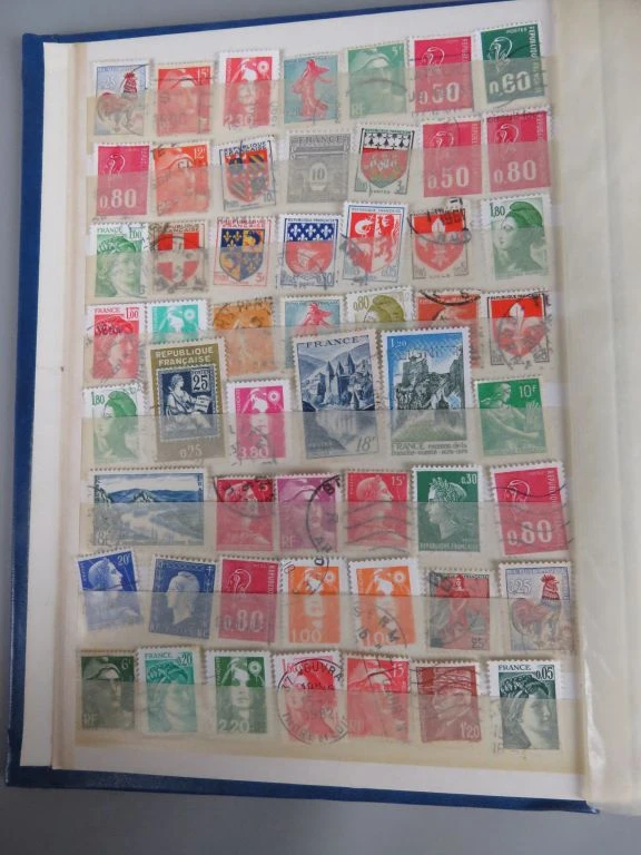 Postzegelverzameling in blauwe King-album