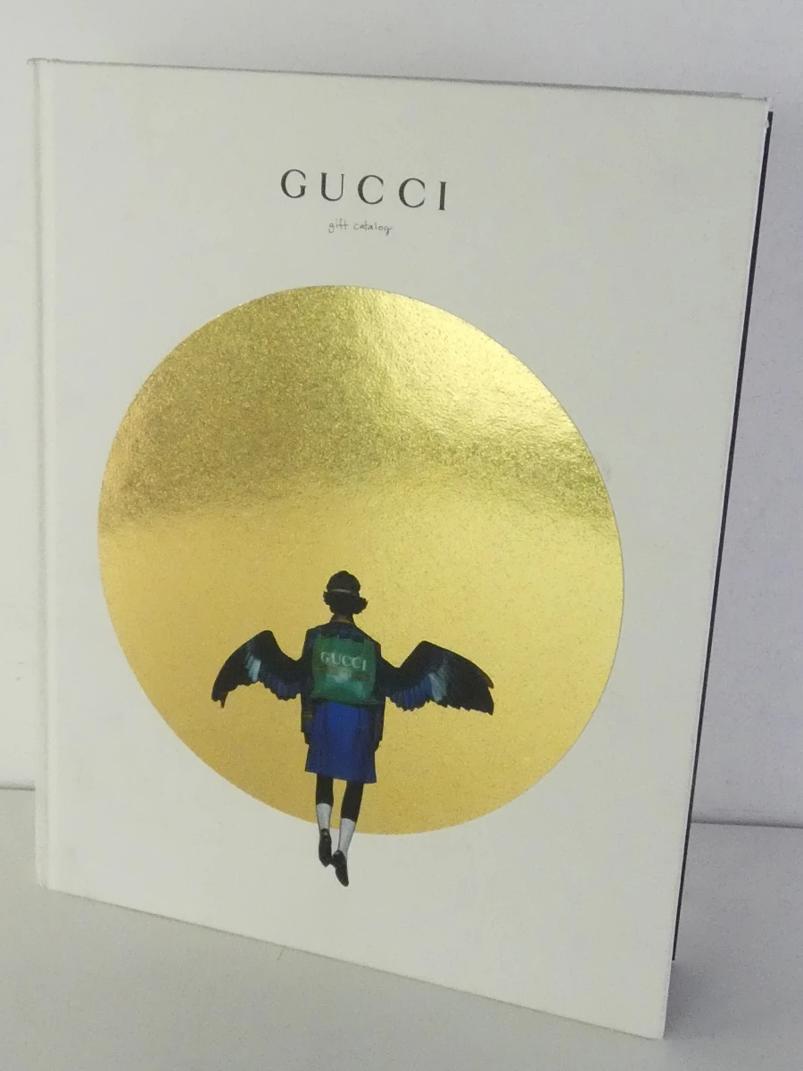 Gucci gift catalog boek met illustraties