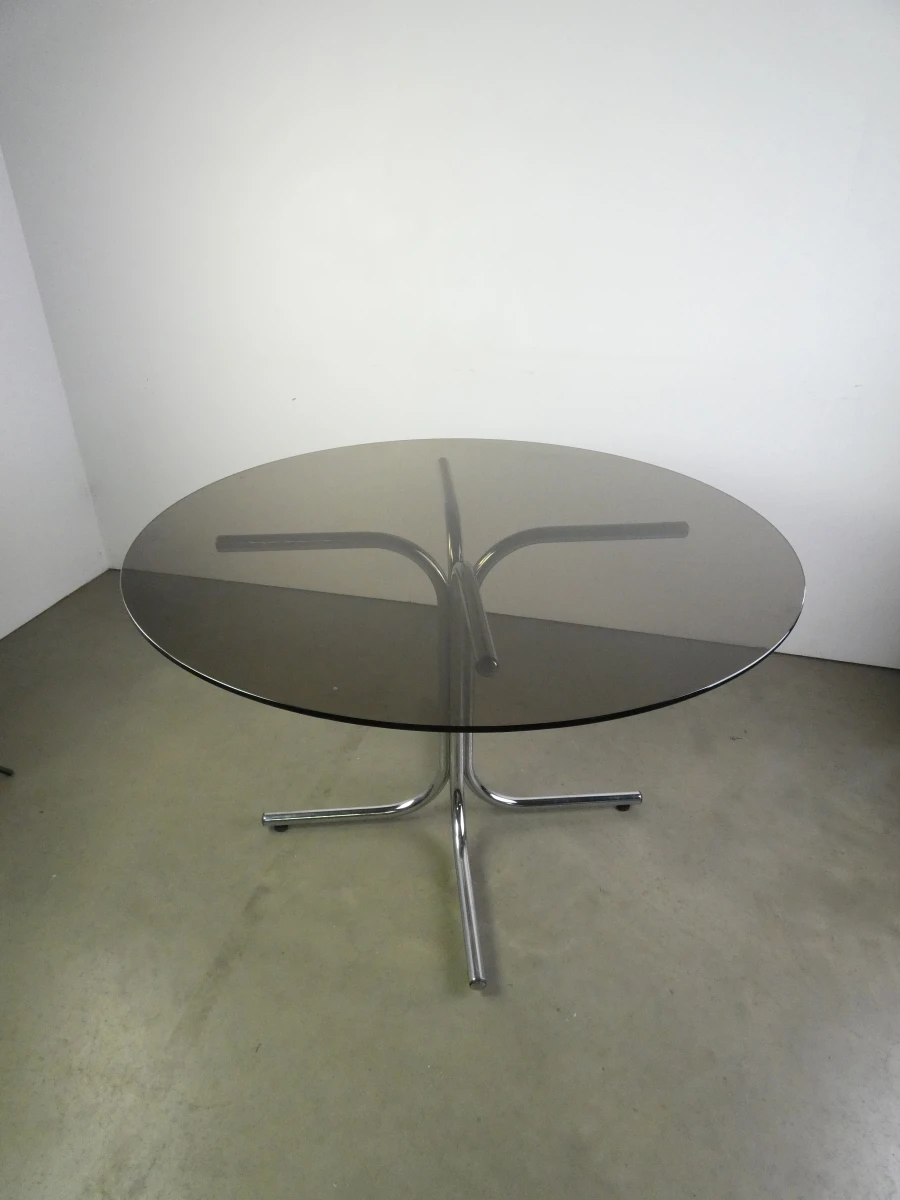 Ronde glazen tafel met chromen onderstel