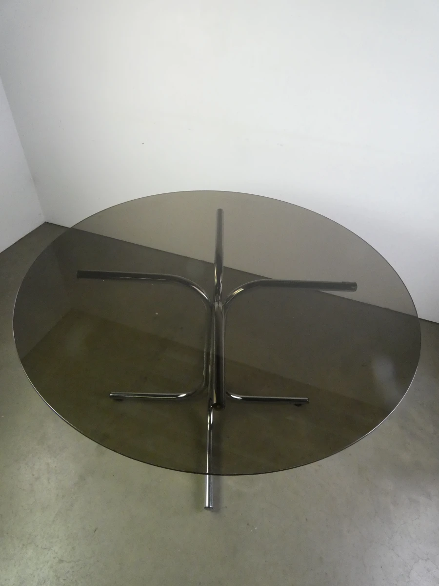 Ronde glazen tafel met chromen onderstel