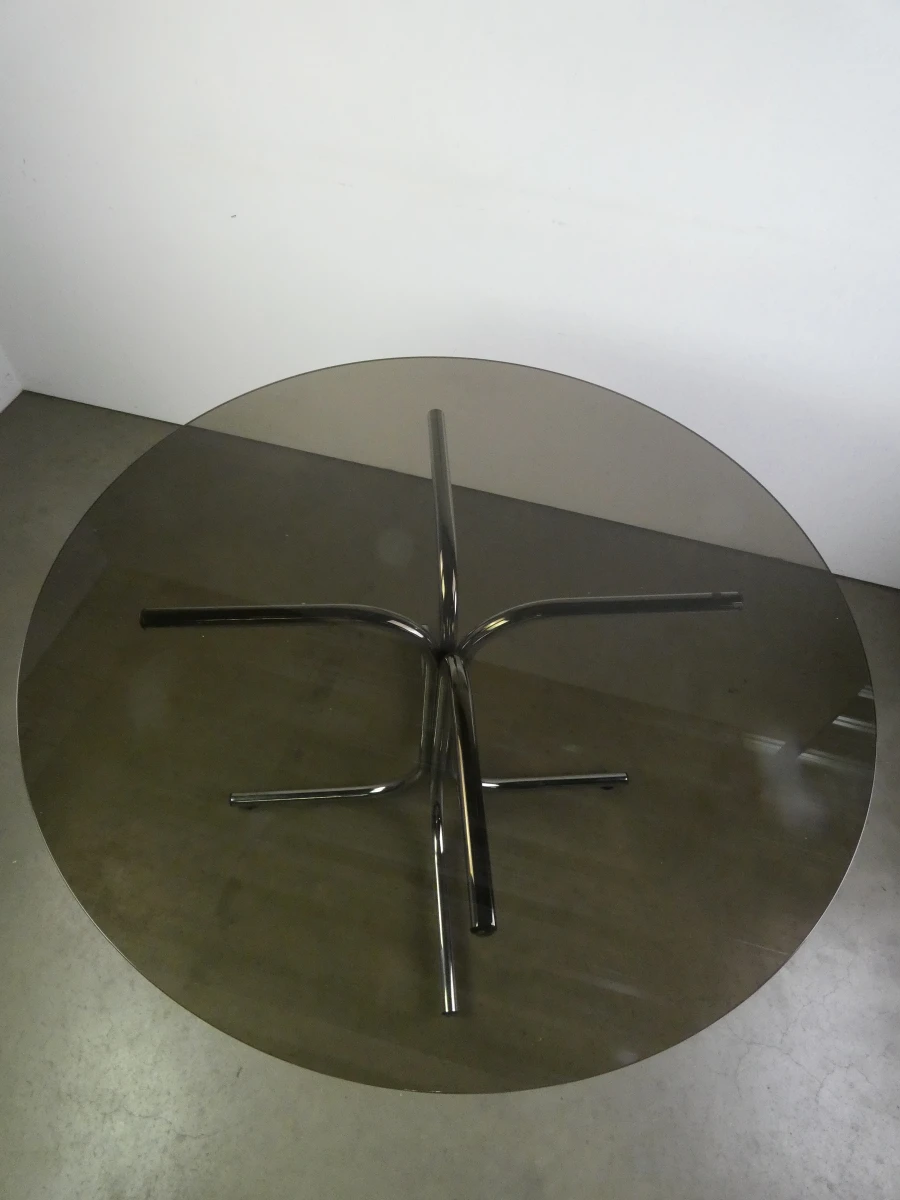 Ronde glazen tafel met chromen onderstel