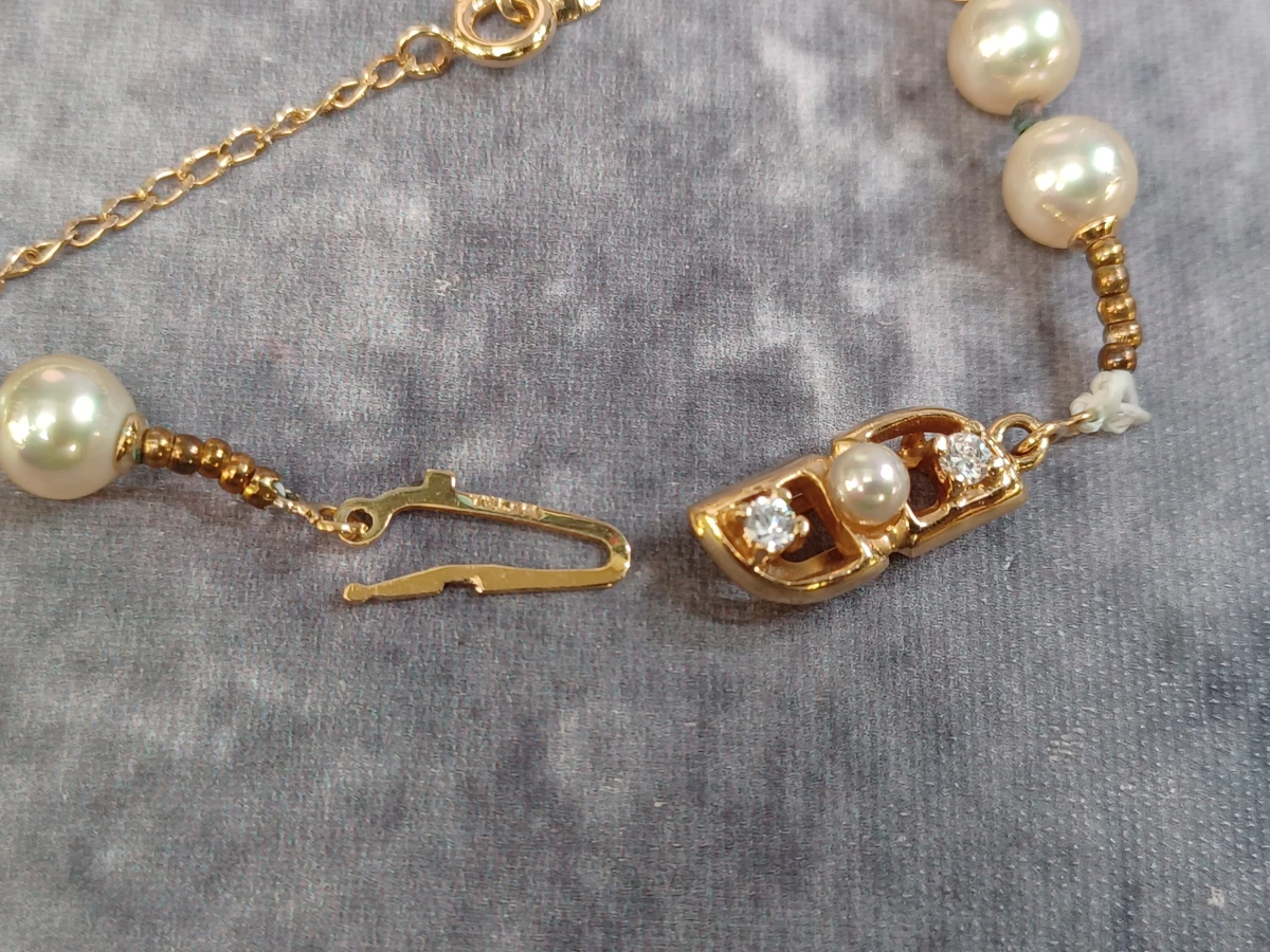 Vintage parelketting met bijbehorende broche - foto 5