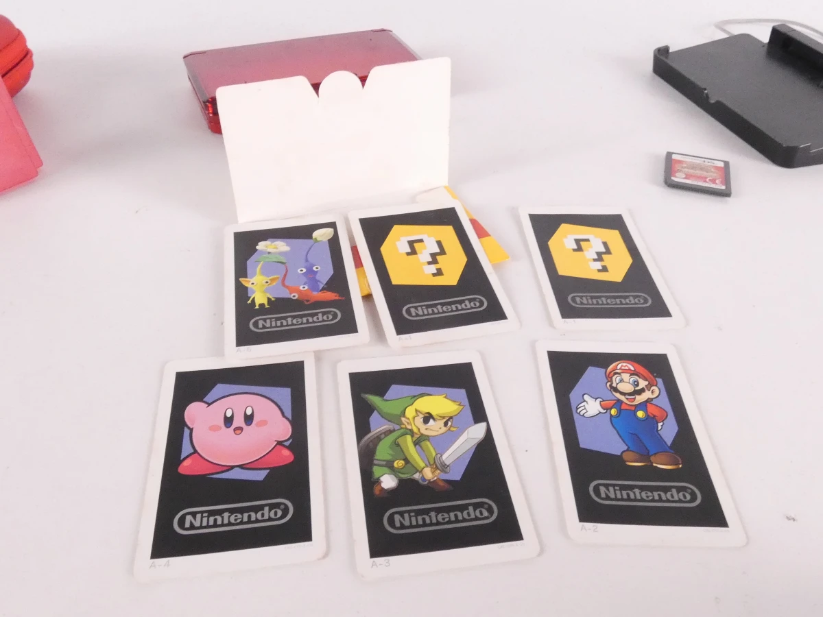 Rode Nintendo 3DS handheld met accessoires en spel - foto 11