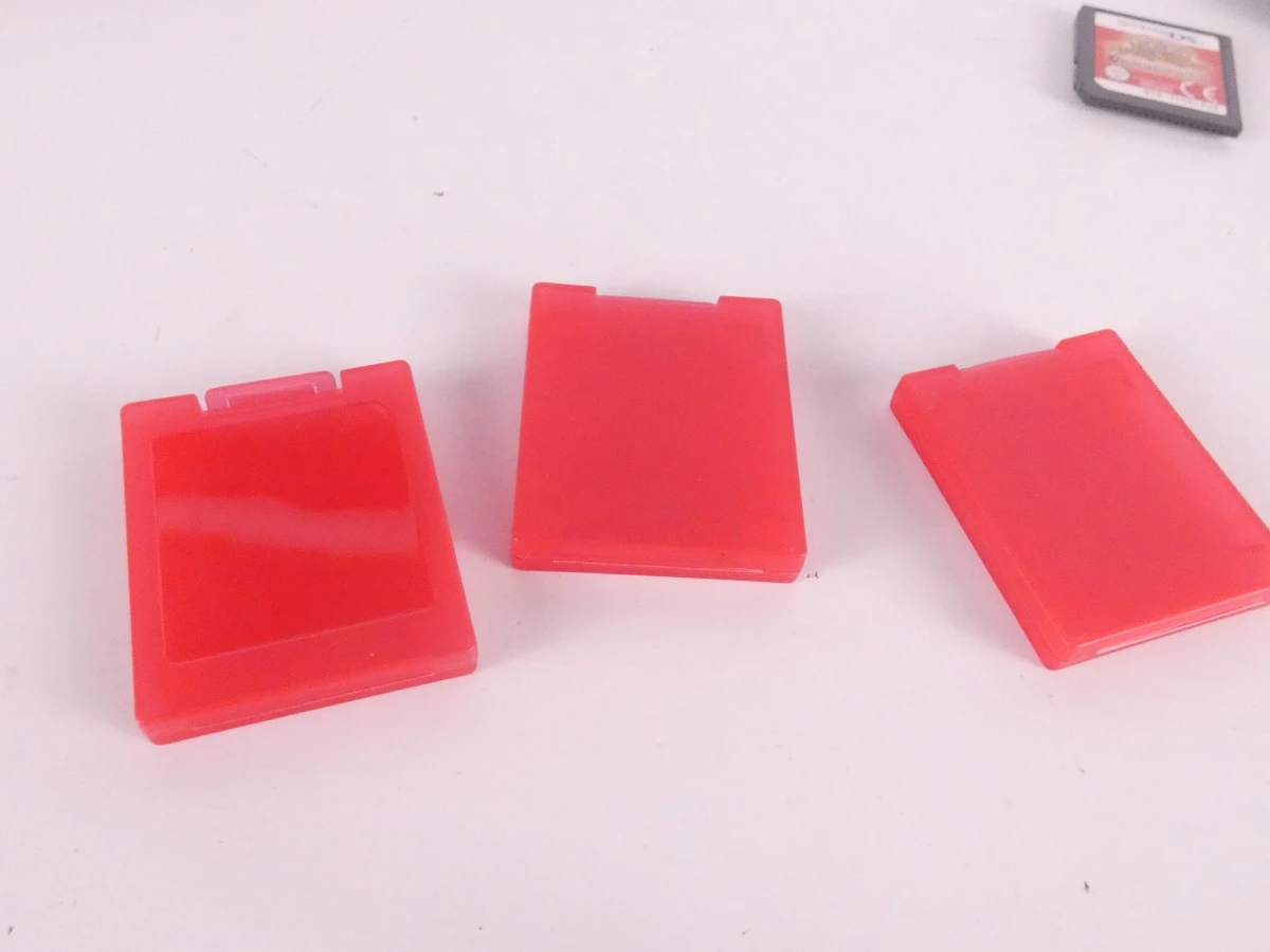 Rode Nintendo 3DS handheld met accessoires en spel - foto 13