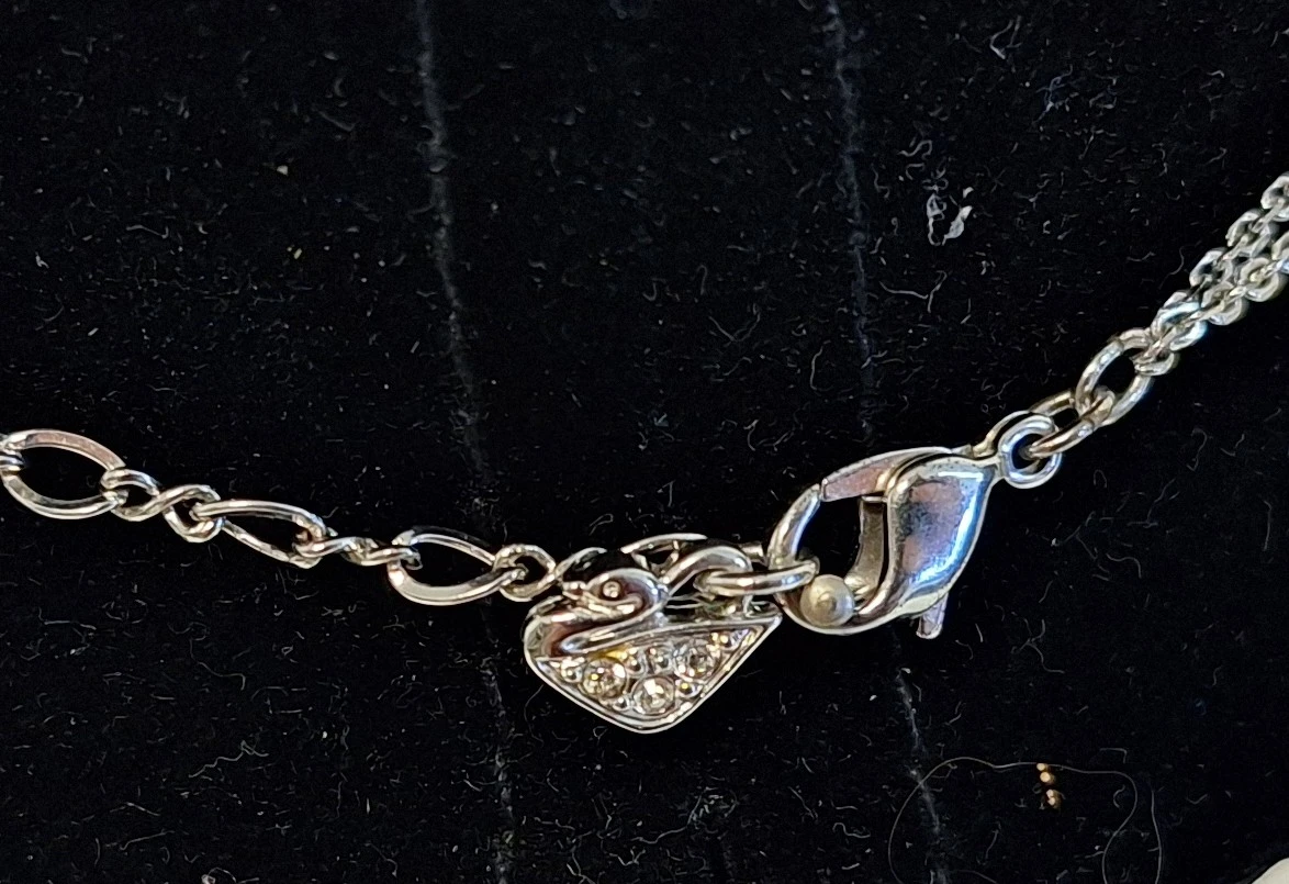 Zilverkleurige ketting met stervormige hanger van Swarovski - foto 4