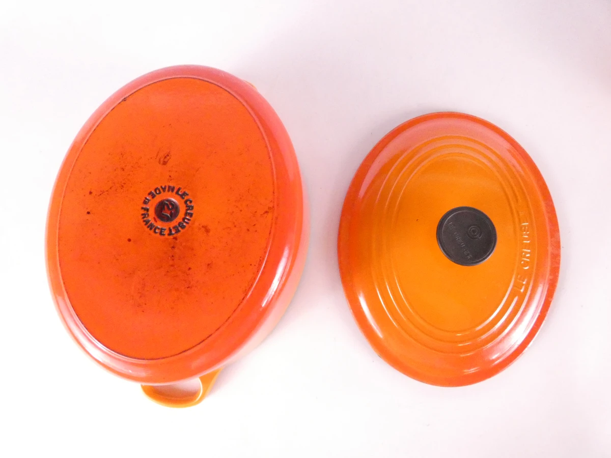 Set Le Creuset gietijzeren kookpotten en ovenschaal oranje - foto 6