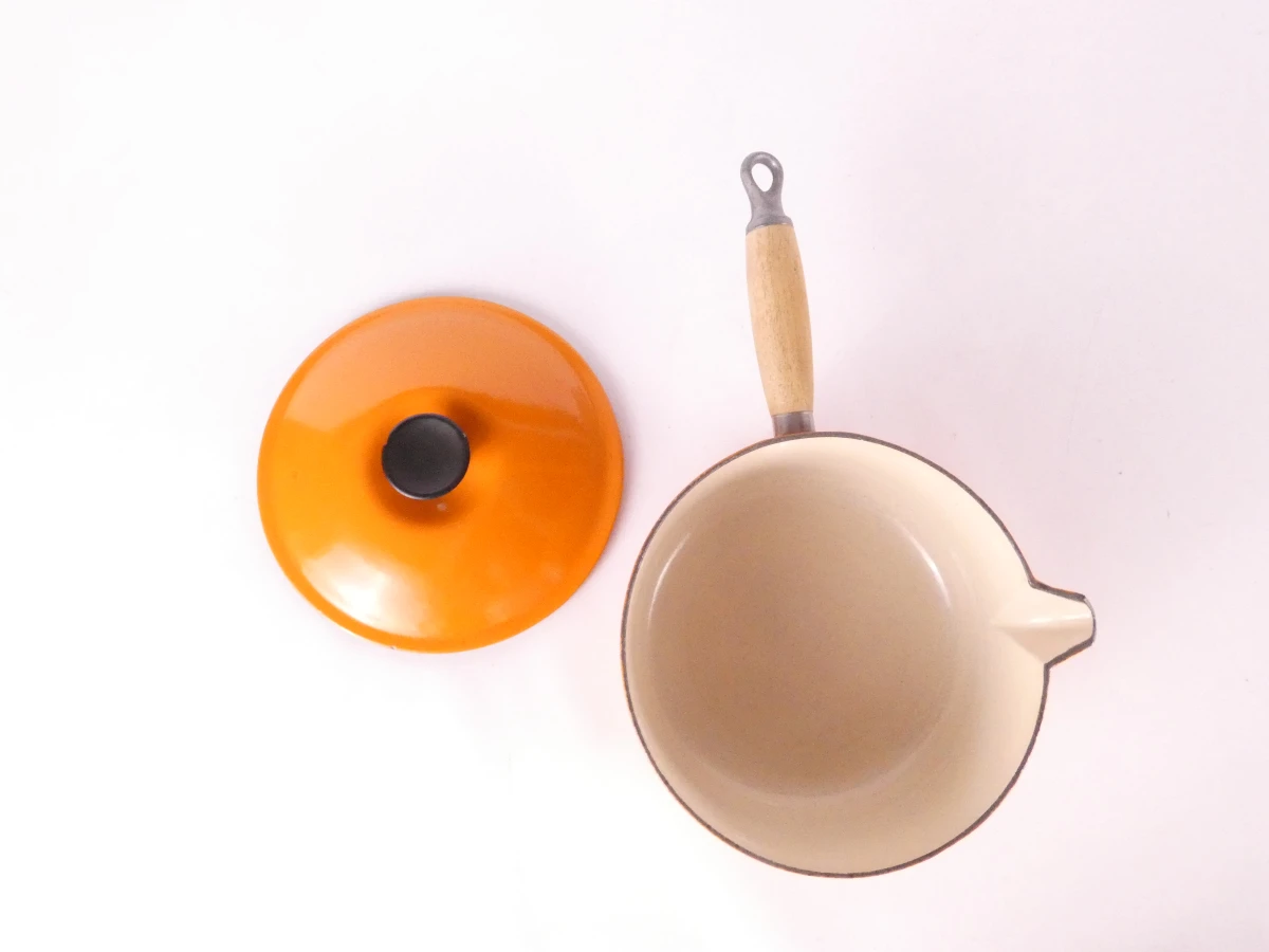 Set Le Creuset gietijzeren kookpotten en ovenschaal oranje - foto 9