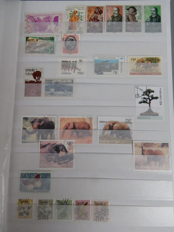Postzegelverzameling in album - foto 54