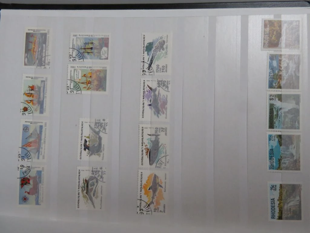 Postzegelverzameling in album - foto 44