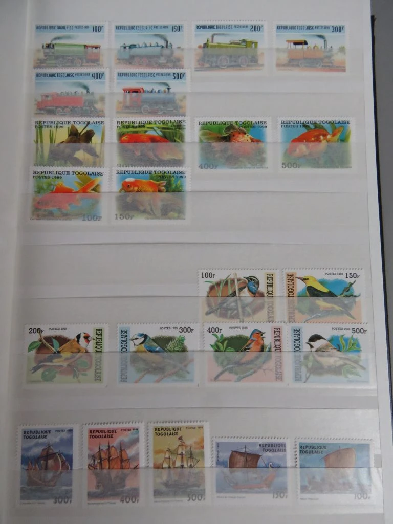 Postzegelverzameling in album - foto 12
