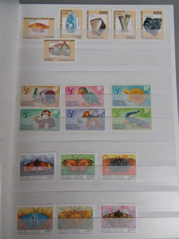 Postzegelverzameling in album - foto 56