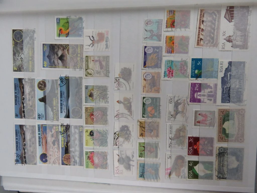 Postzegelverzameling in album - foto 45