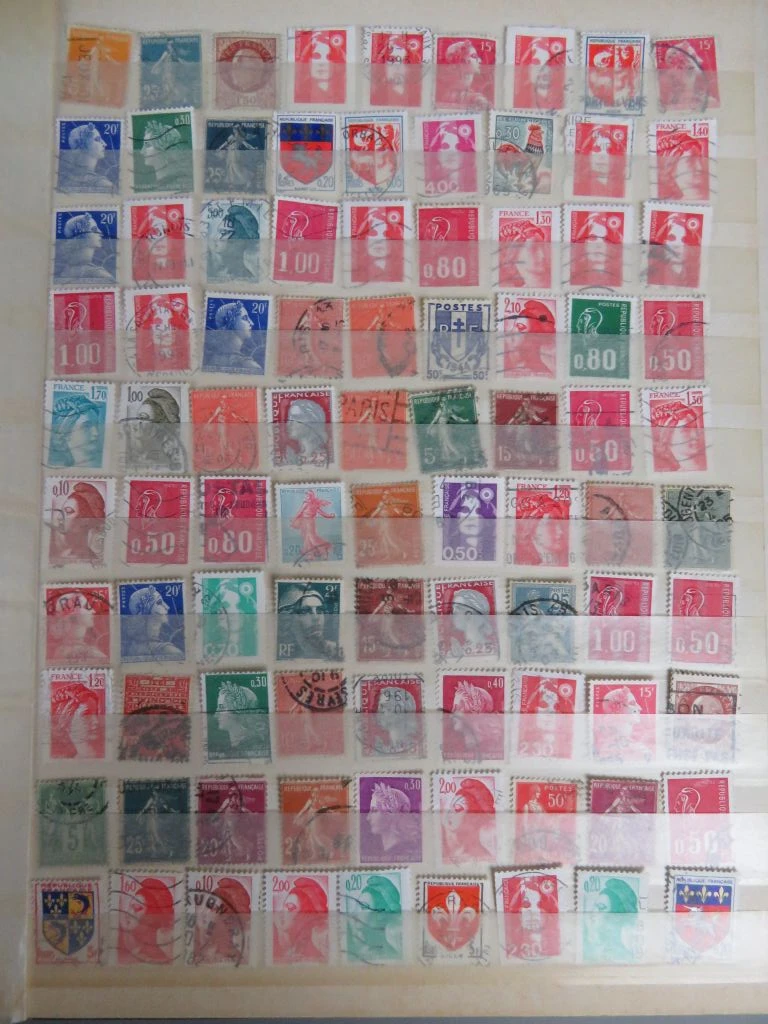 Postzegelverzameling in blauwe map - foto 14