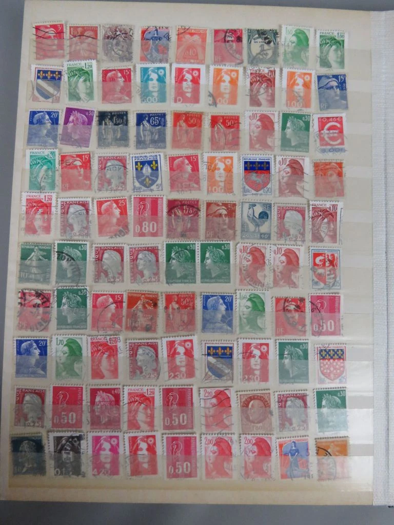 Postzegelverzameling in blauwe map - foto 13