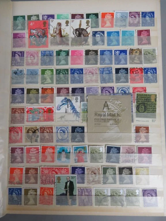 Postzegelverzameling in blauwe map - foto 2