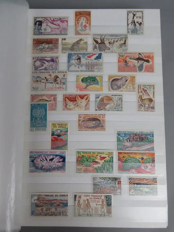Postzegelverzameling in oranje album - foto 39