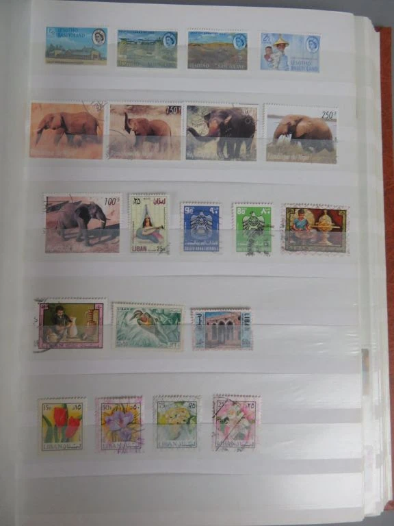 Postzegelverzameling in oranje album - foto 11