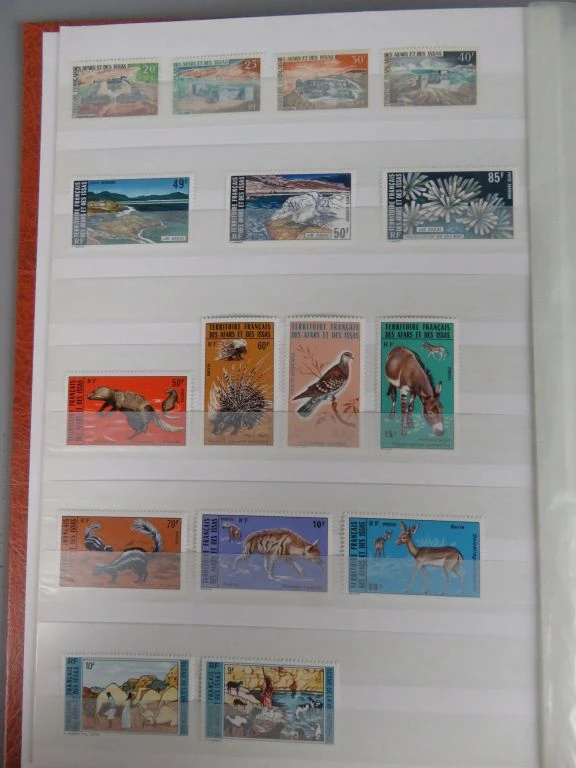 Postzegelverzameling in oranje album - foto 40