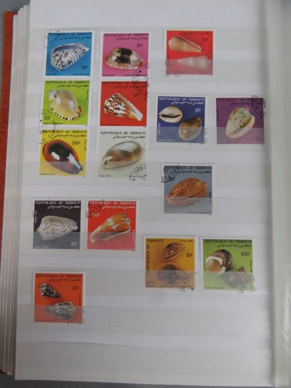 Postzegelverzameling in oranje album - foto 14