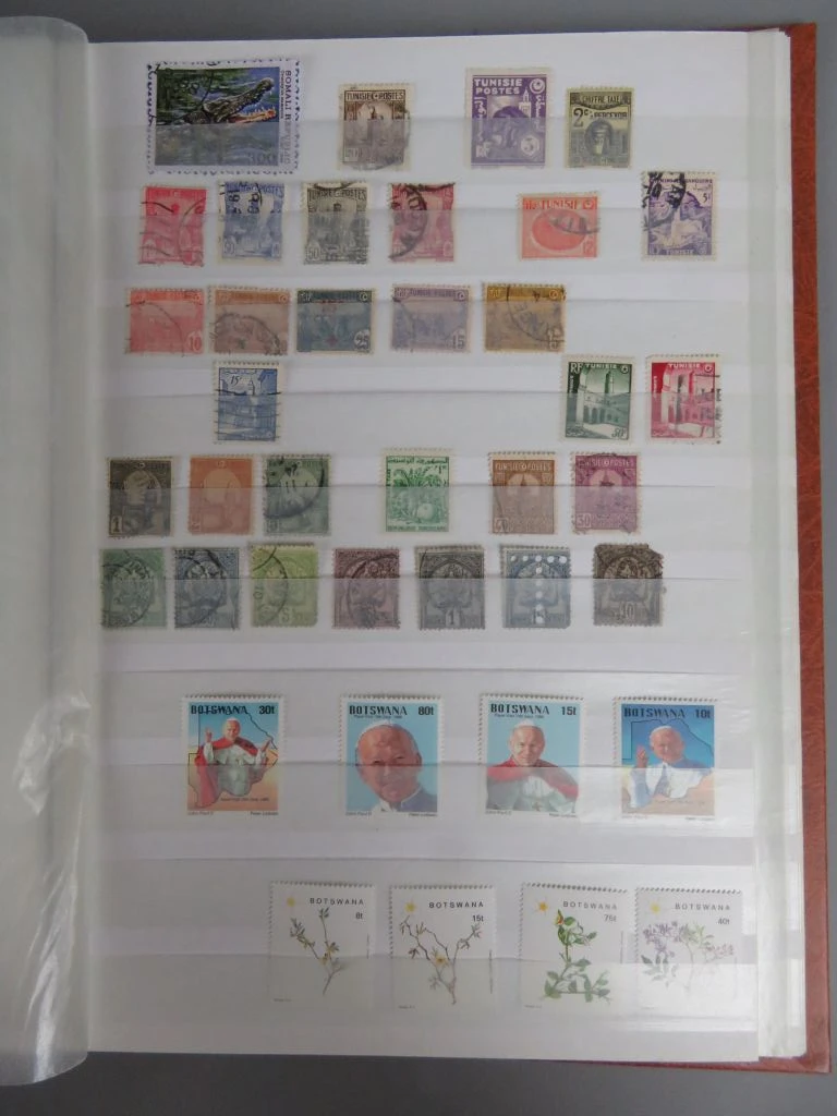 Postzegelverzameling in oranje album - foto 31