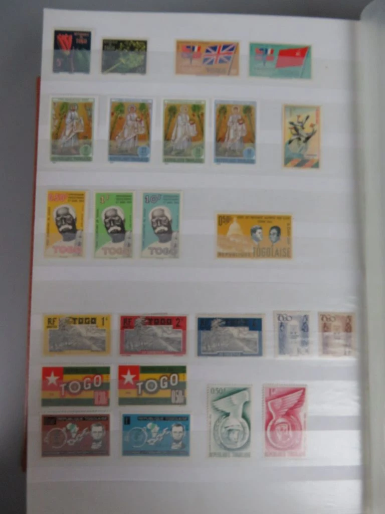 Postzegelverzameling in oranje album - foto 28