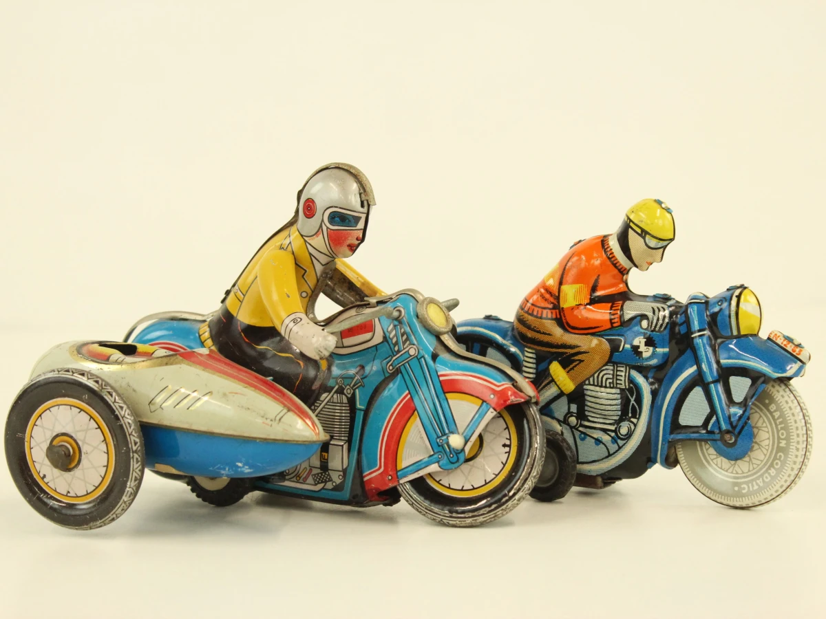 Set van twee vintage blikken motoren - foto 11