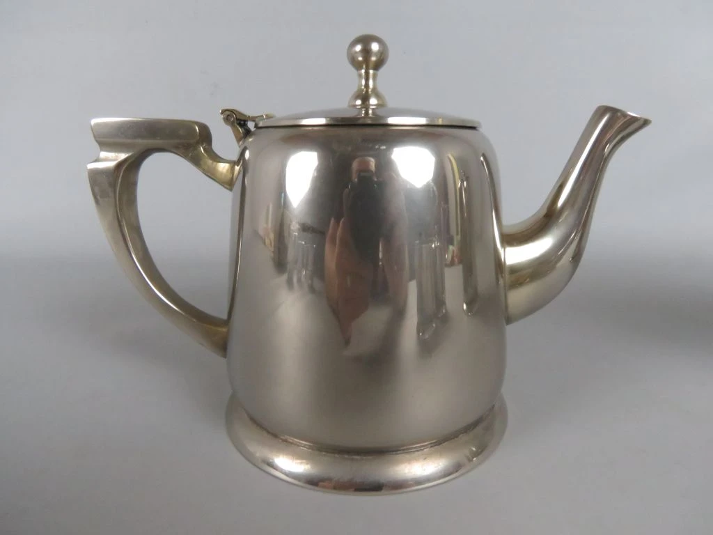Set zilverkleurig koffie- en theeservies met kan, pot en melkkan - foto 2