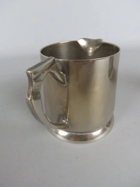 Set zilverkleurig koffie- en theeservies met kan, pot en melkkan - foto 10