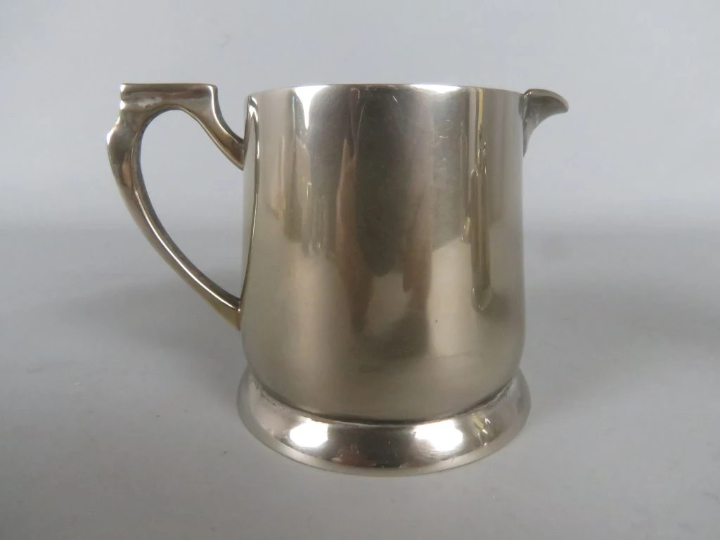 Set zilverkleurig koffie- en theeservies met kan, pot en melkkan - foto 9