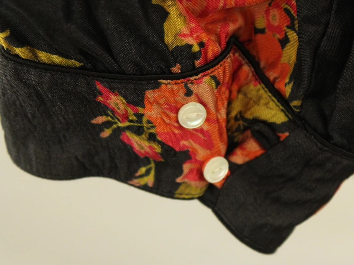 StandAloné zwarte blouse met oranje bloemenprint - foto 5