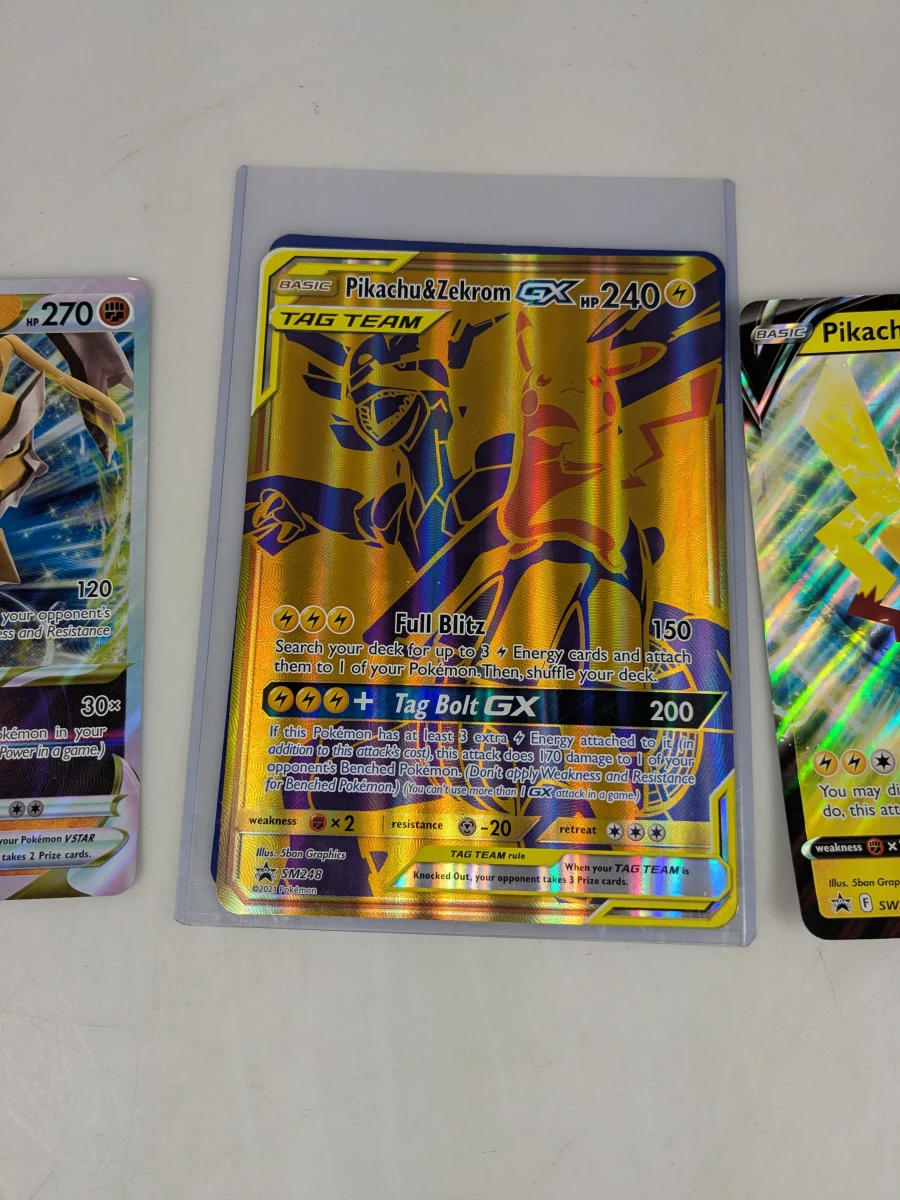 Pokémon tin met kaarten en verzamelaccessoires met binder - foto 8
