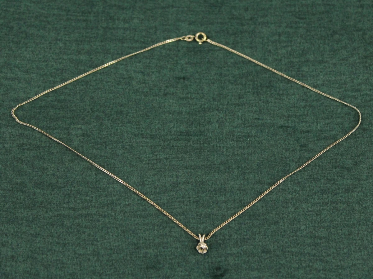 14 karaat witgouden halsketting met bloemvormig diamant hangertje - foto 2