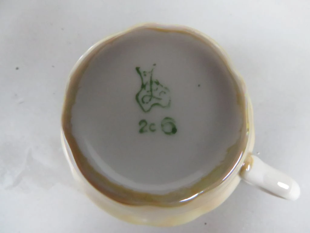 Vintage servies met kopjes, schotels en suikerpot - foto 2