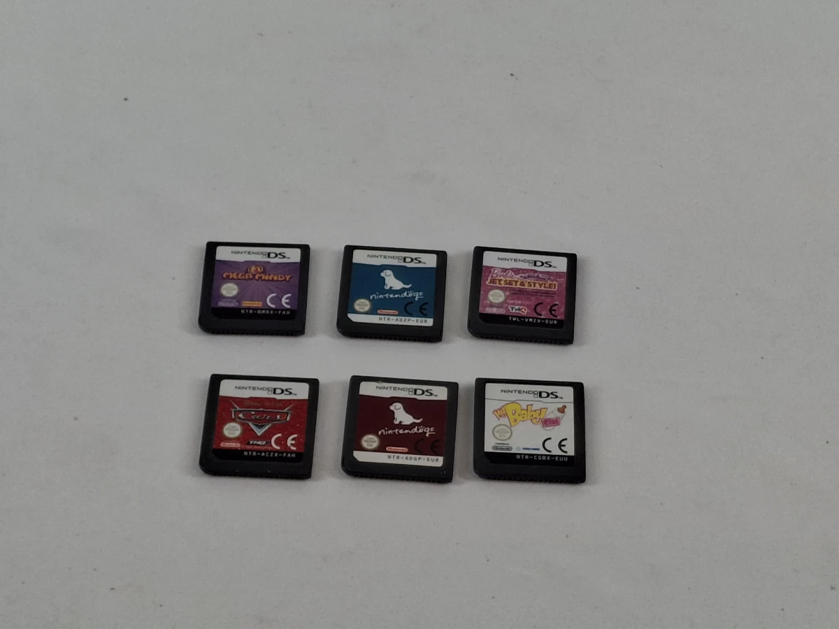 Nintendo DS met oplader en 6 spelcartridges – foto 2 – kavel bij De Kringwinkel, Geraardsbergen
