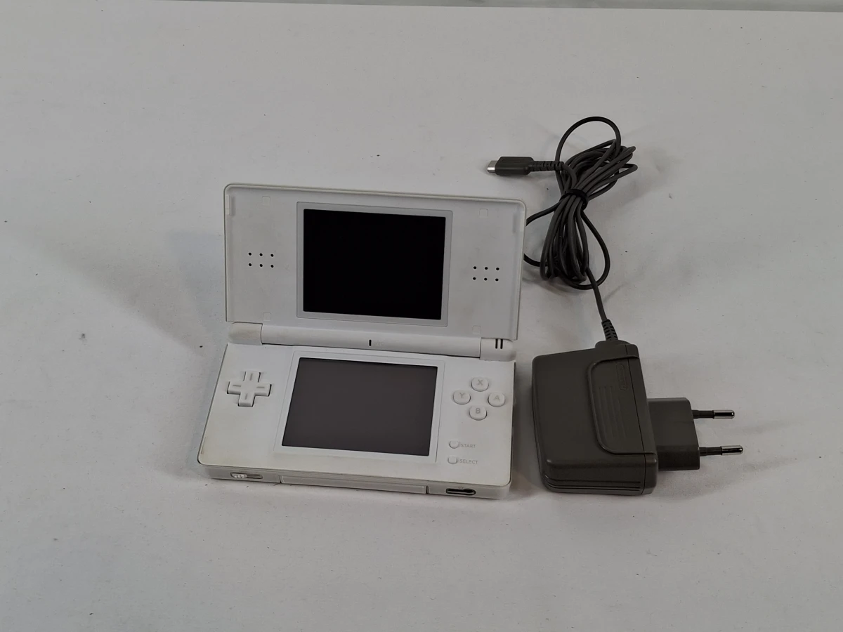 Nintendo DS met oplader en 6 spelcartridges - foto 4