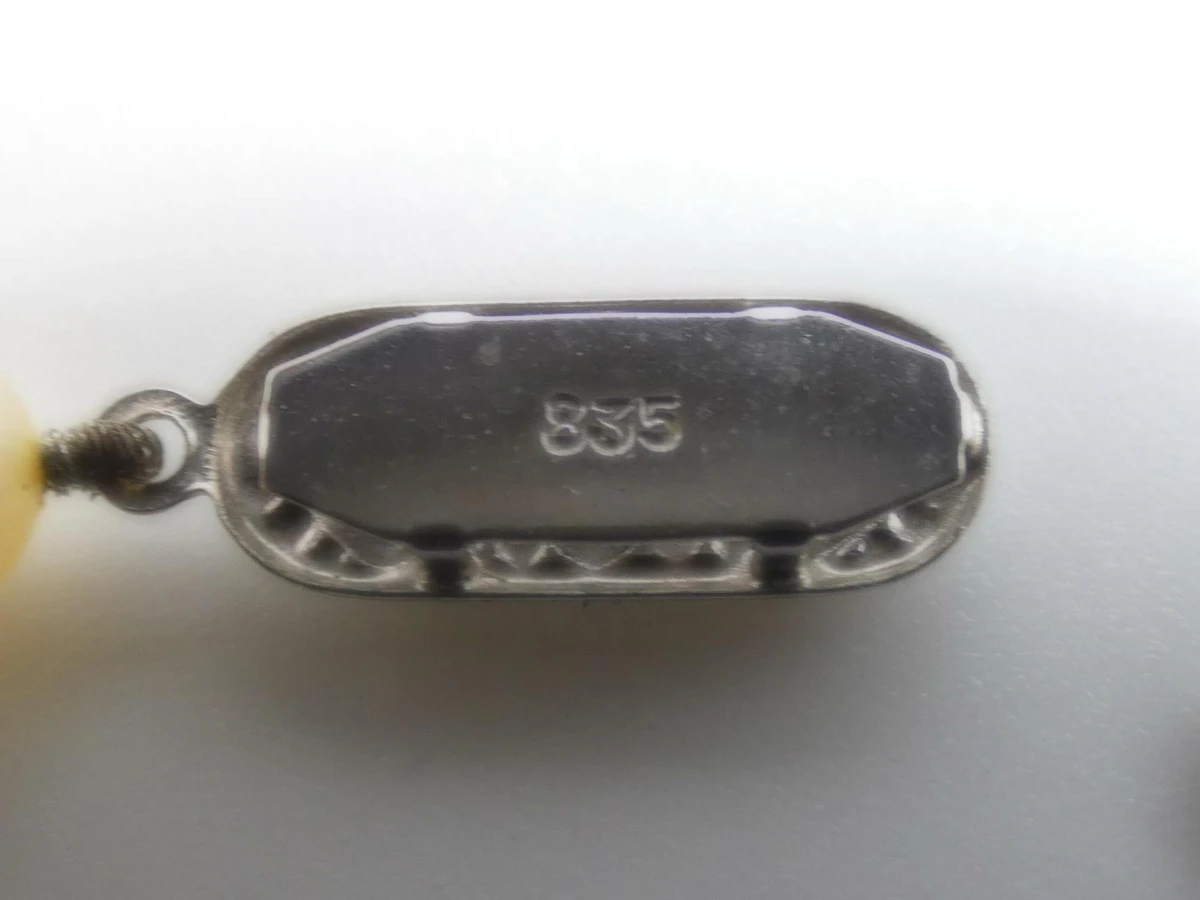 Lange parelketting met zilveren sluiting - foto 5