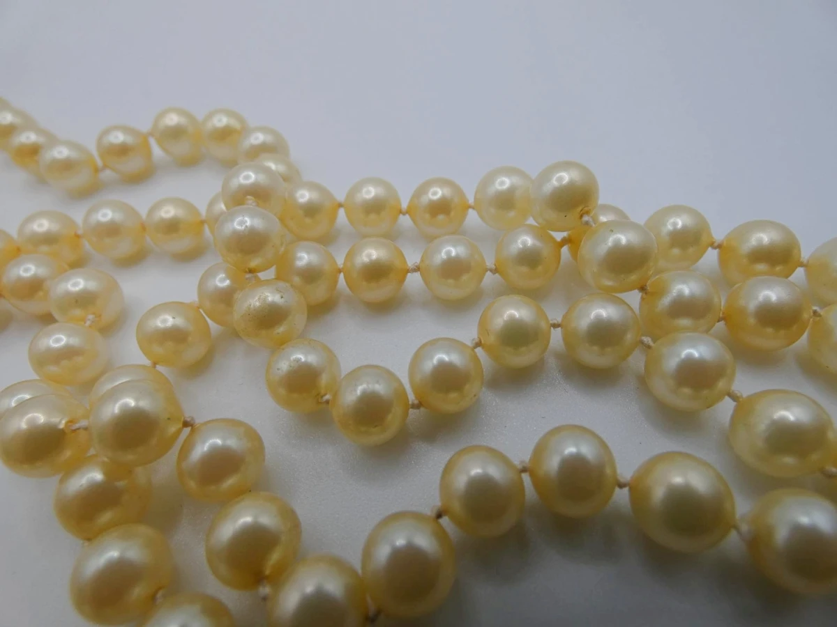 Lange parelketting met zilveren sluiting - foto 6