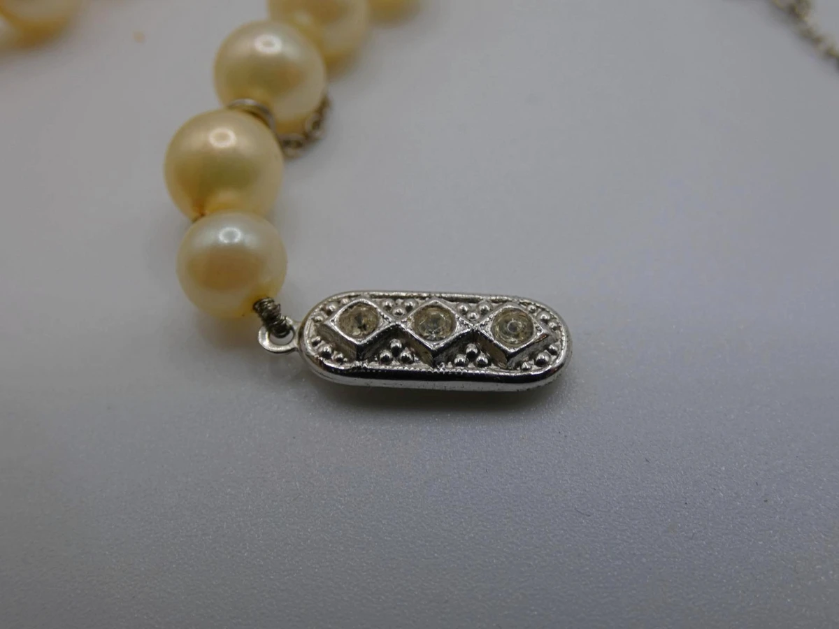Lange parelketting met zilveren sluiting - foto 3