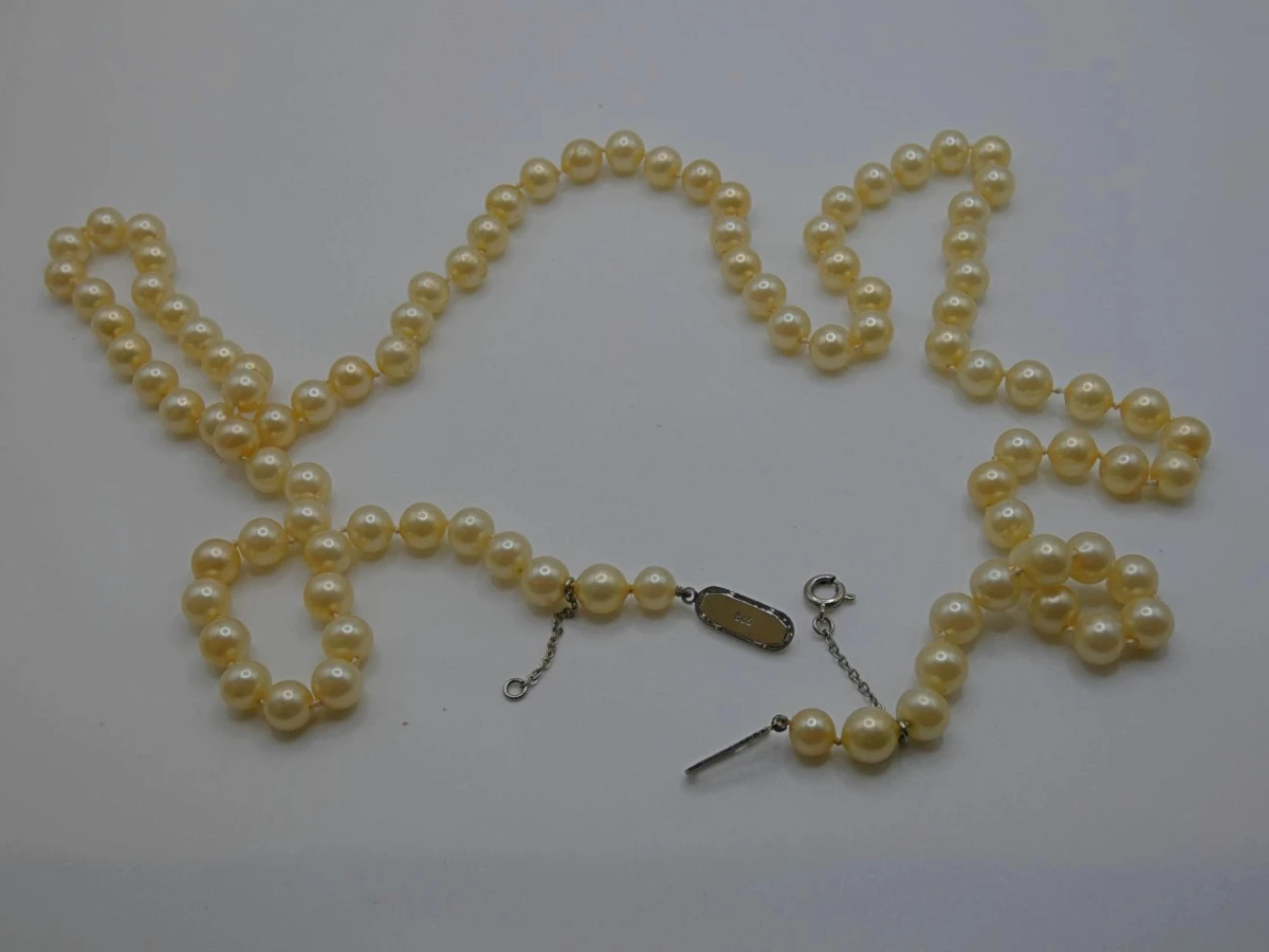 Lange parelketting met zilveren sluiting - foto 2