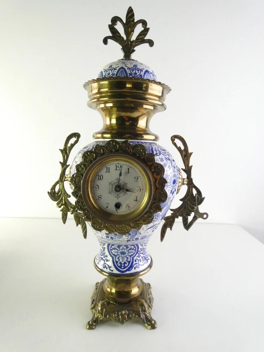 Vintage blauw-wit porseleinen klokstel met messing details - foto 4