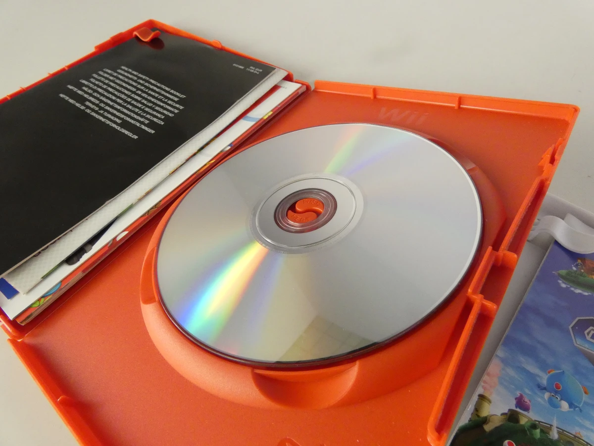 Set van 4 Wii-spellen met hoes en handleiding - foto 4