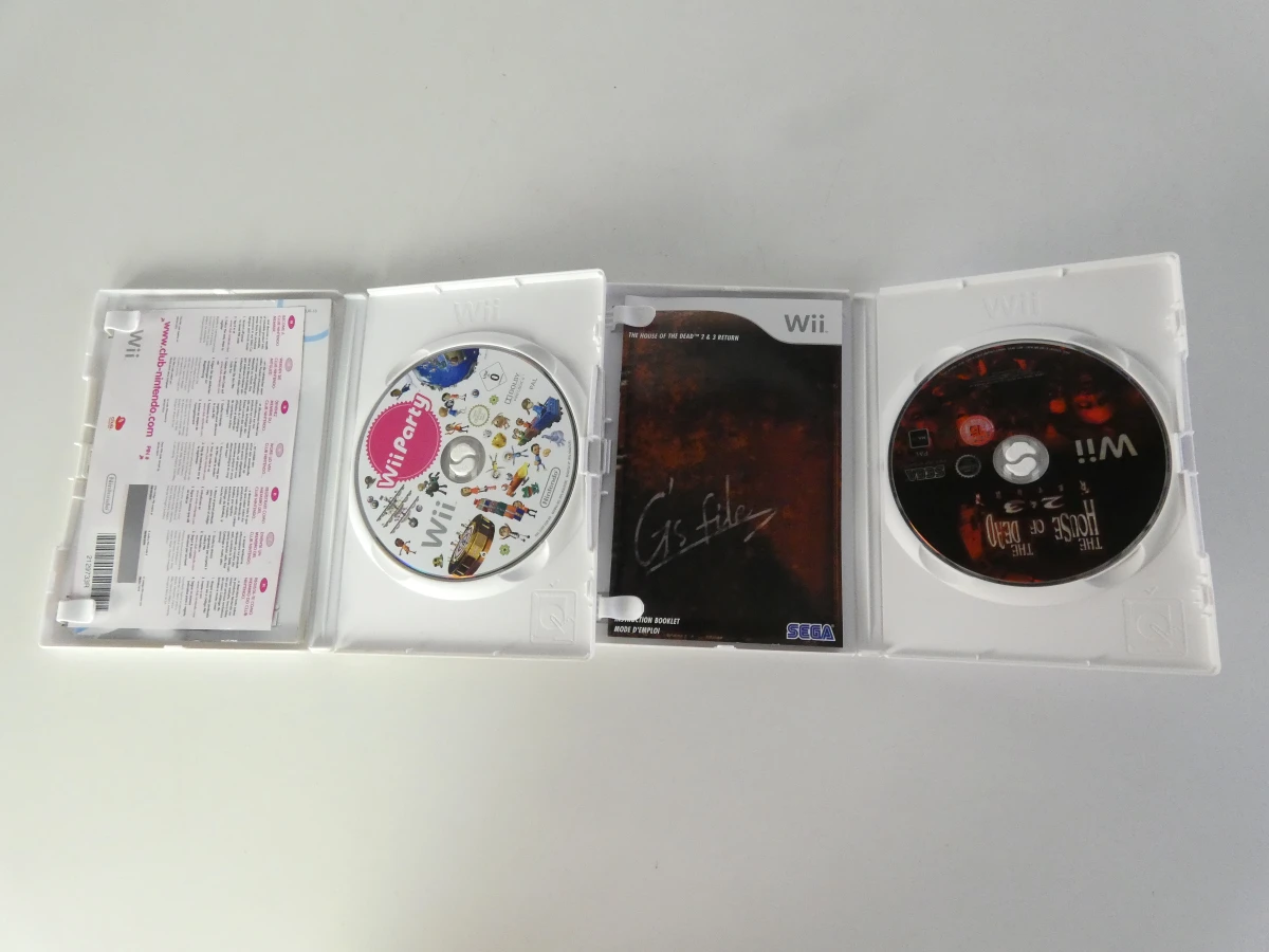 Set van 4 Wii-spellen met hoes en handleiding - foto 8