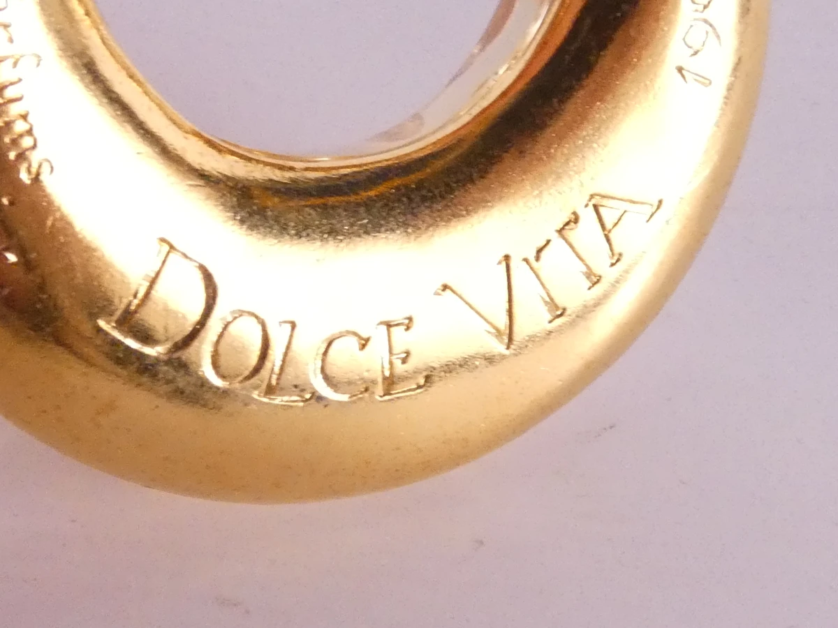Christian Dior: Vintage oorbellen en Dolce Vita broche - foto 14