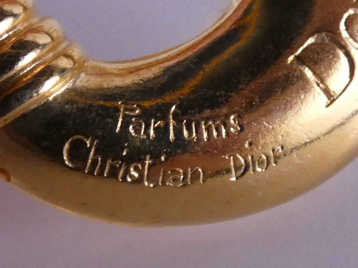 Christian Dior: Vintage oorbellen en Dolce Vita broche - foto 17
