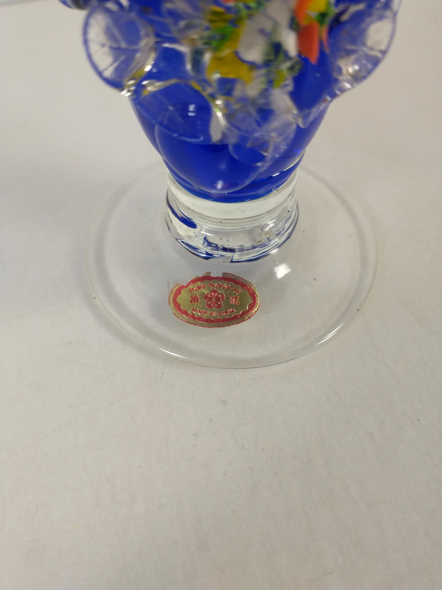 Blauwe glazen vaas met bloemdecoratie - foto 7
