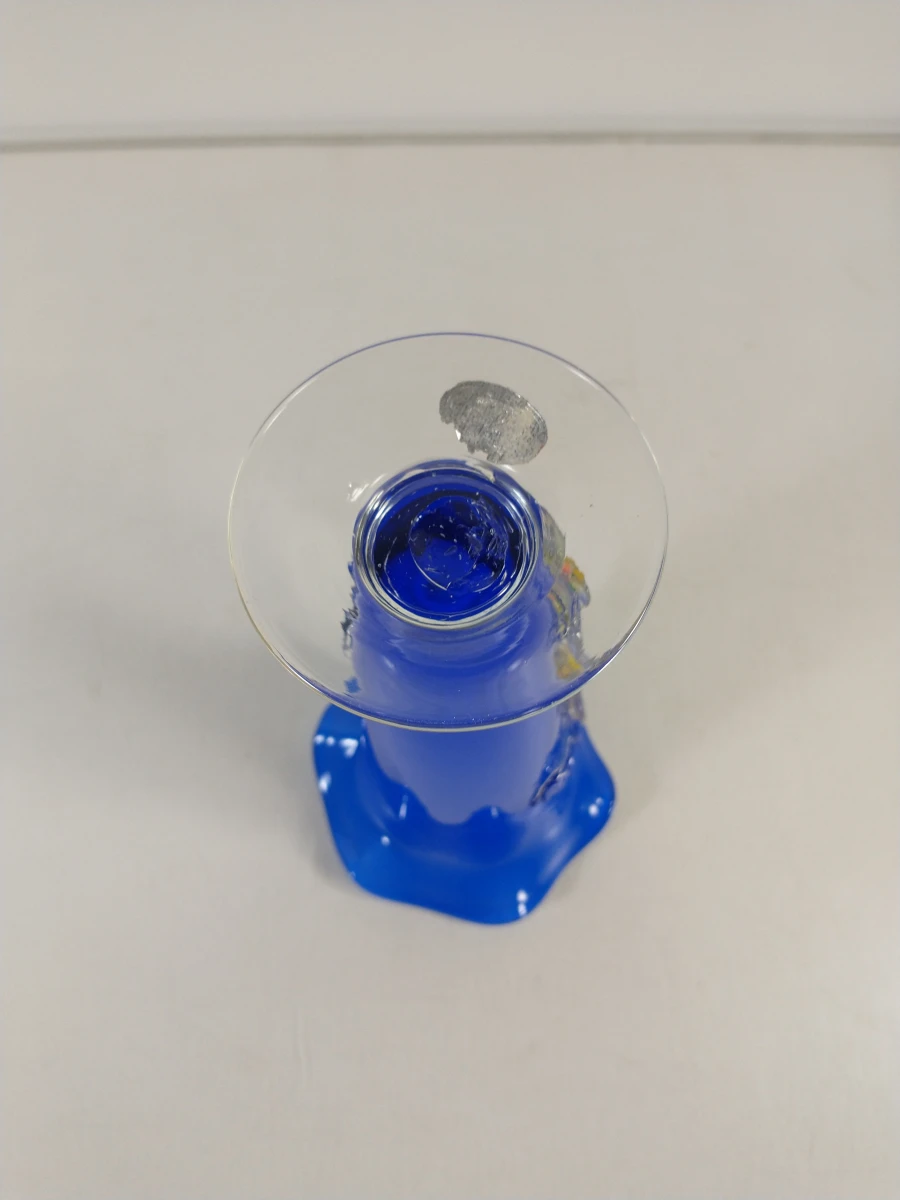 Blauwe glazen vaas met bloemdecoratie - foto 10